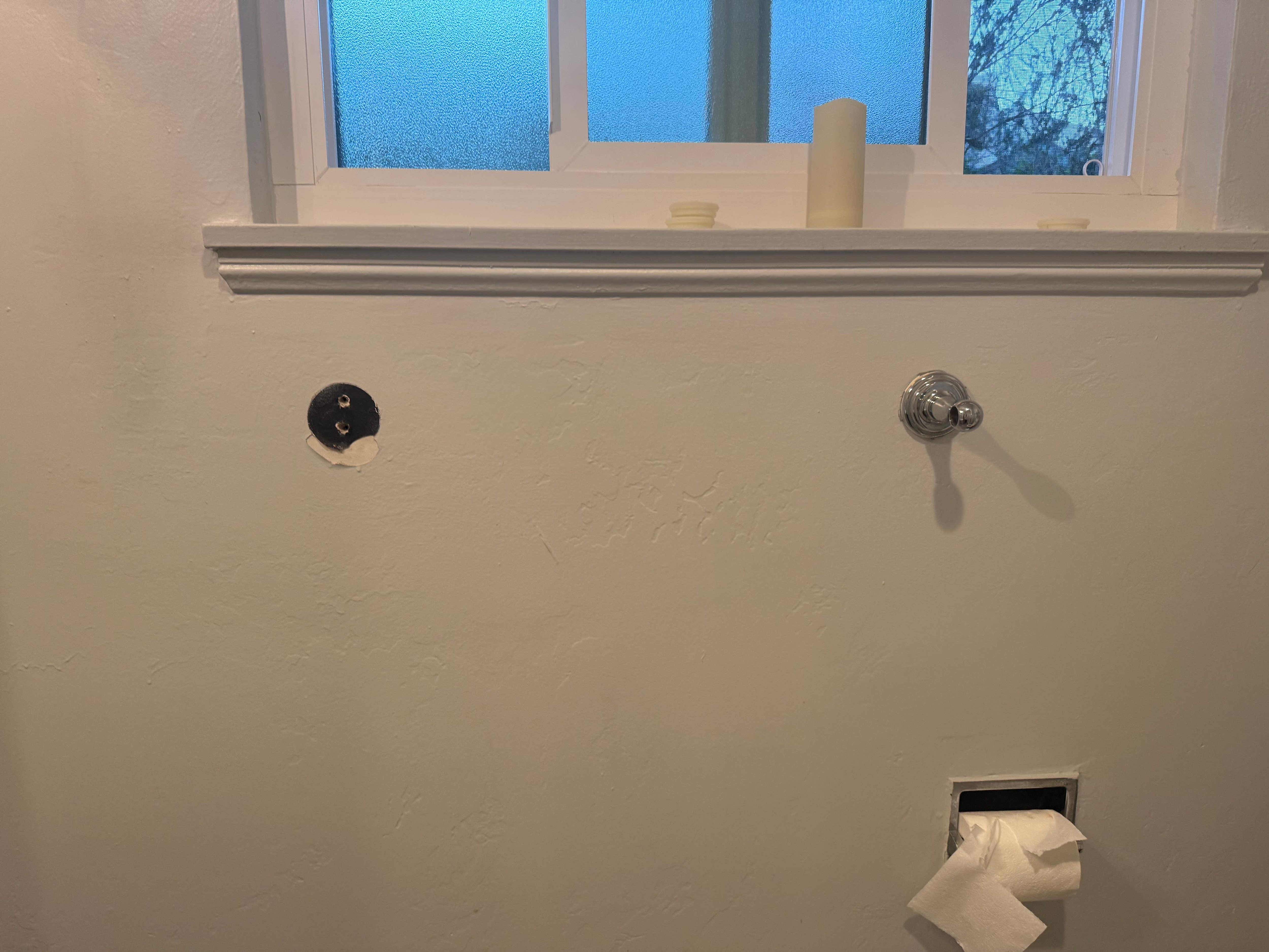 Bathroom fixture ripped out of wall