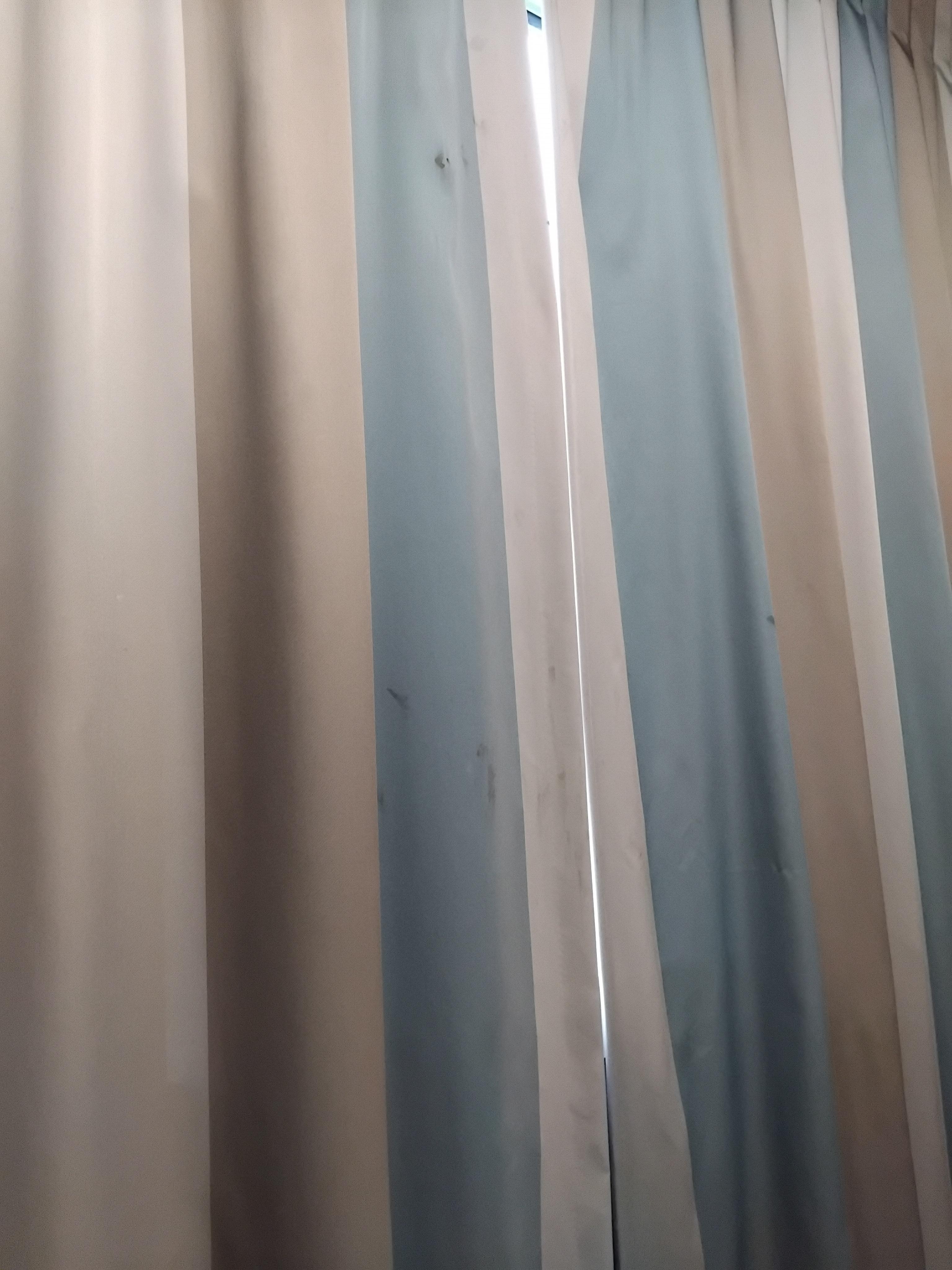 Gross brown stains on curtains