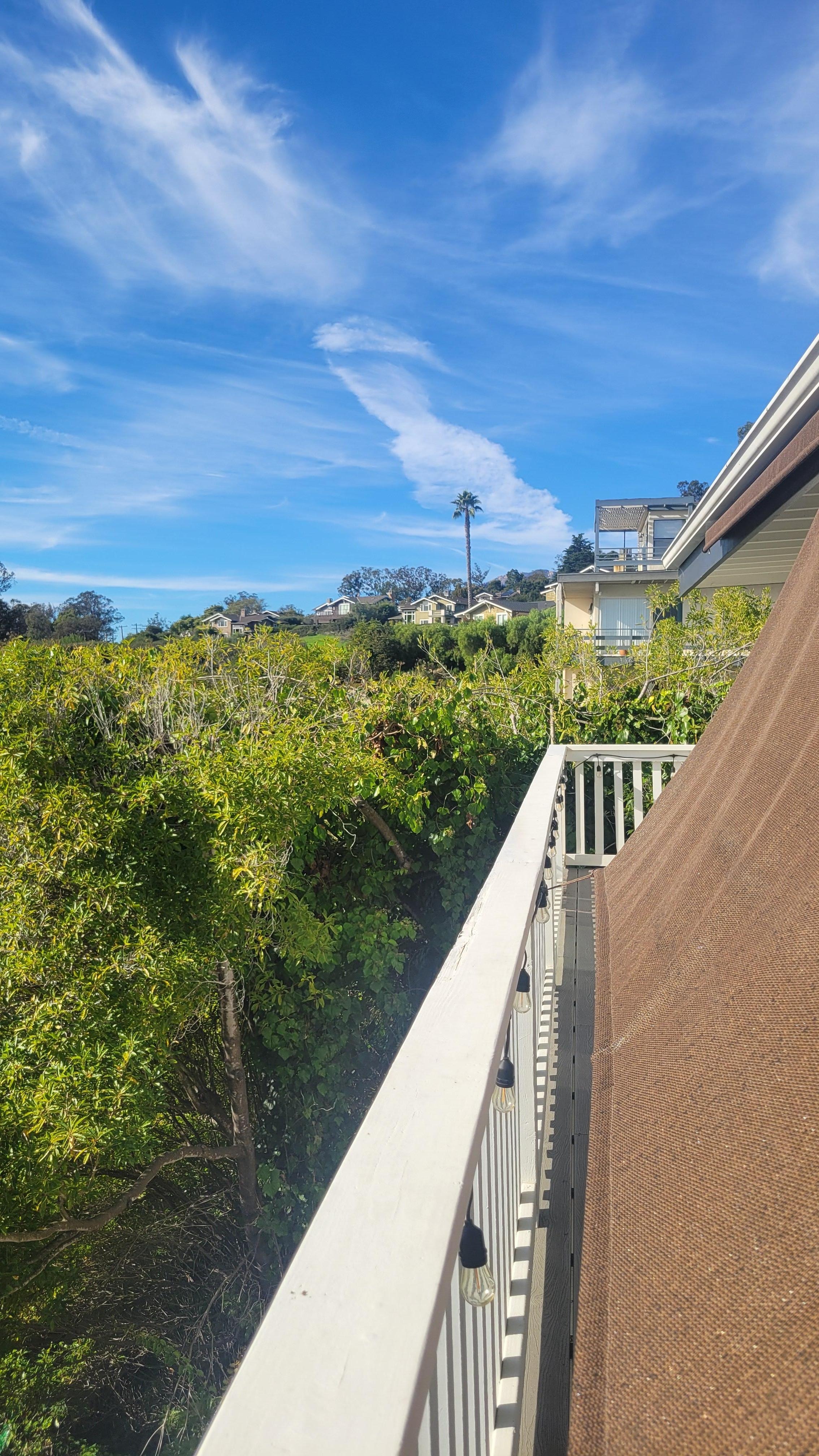 The deck upstairs has a canopy for shade you can pull down and attach to the deck.