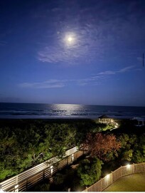 Early moon rising from the balcony