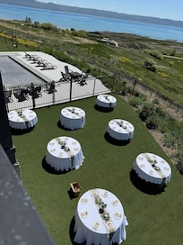 Guests carried their chairs over to tables after wedding ceremony.
