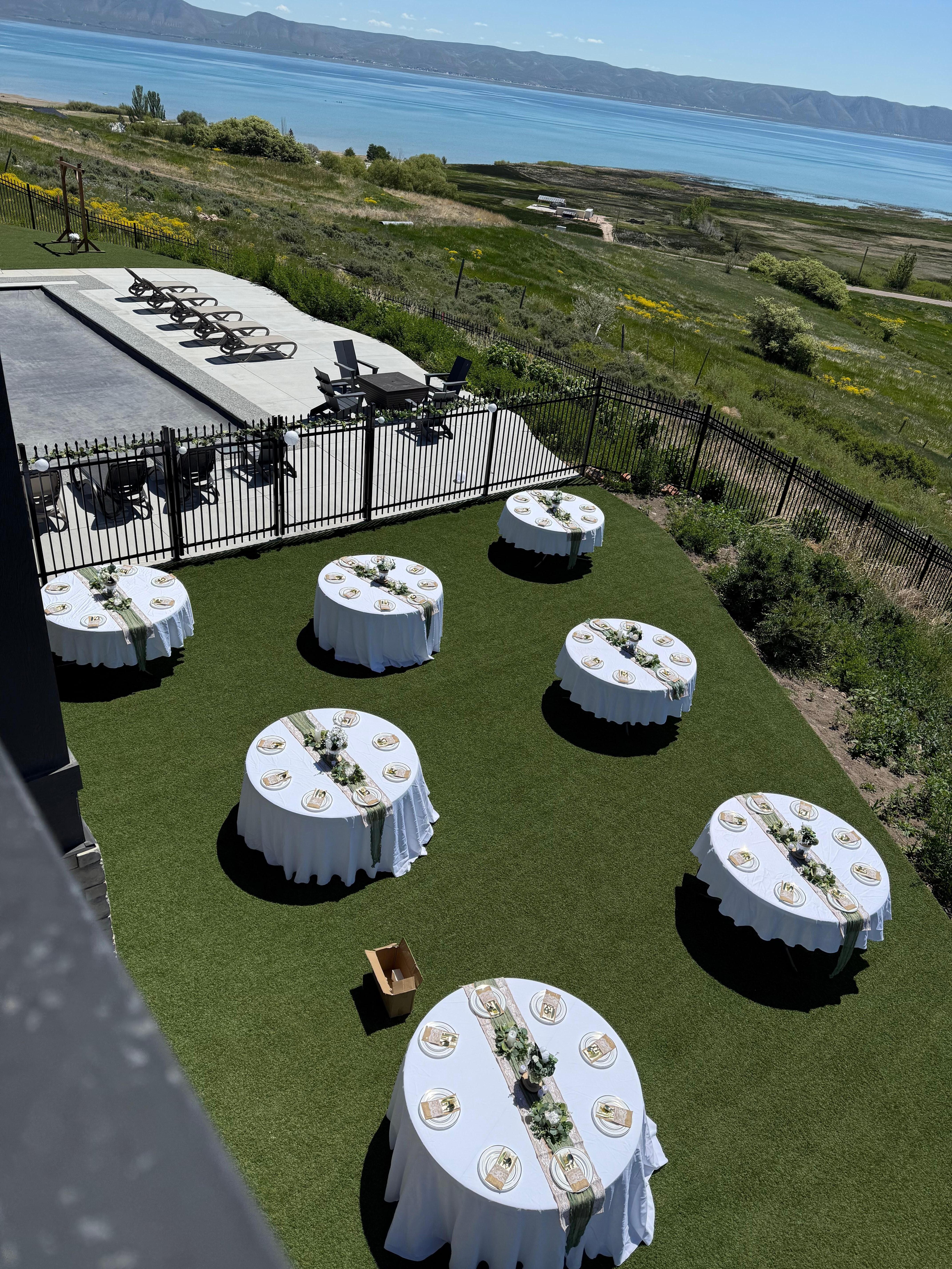 Guests carried their chairs over to tables after wedding ceremony. 