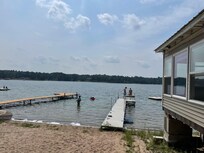 The sandy beach, beach porch, s’mores fire pit, pool noodles, paddle boat, canoe, and 2 kayaks added fun!