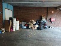 Rubbish in view of patrons at parking lots next to receptionist.