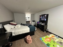 Room 201- king size bedroom. With a bathtub.