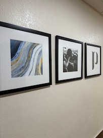 The gym and pool lobby portraits outside of the elevator!