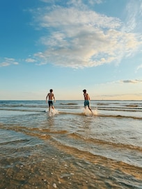 Running through the shallow waves- VERY kid-friendly beach! :)