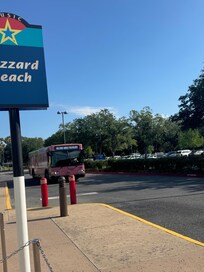 Busses station at front of resort.