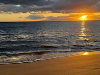 Beautiful sunset at beach across the street.