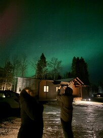 Front of property with northern lights