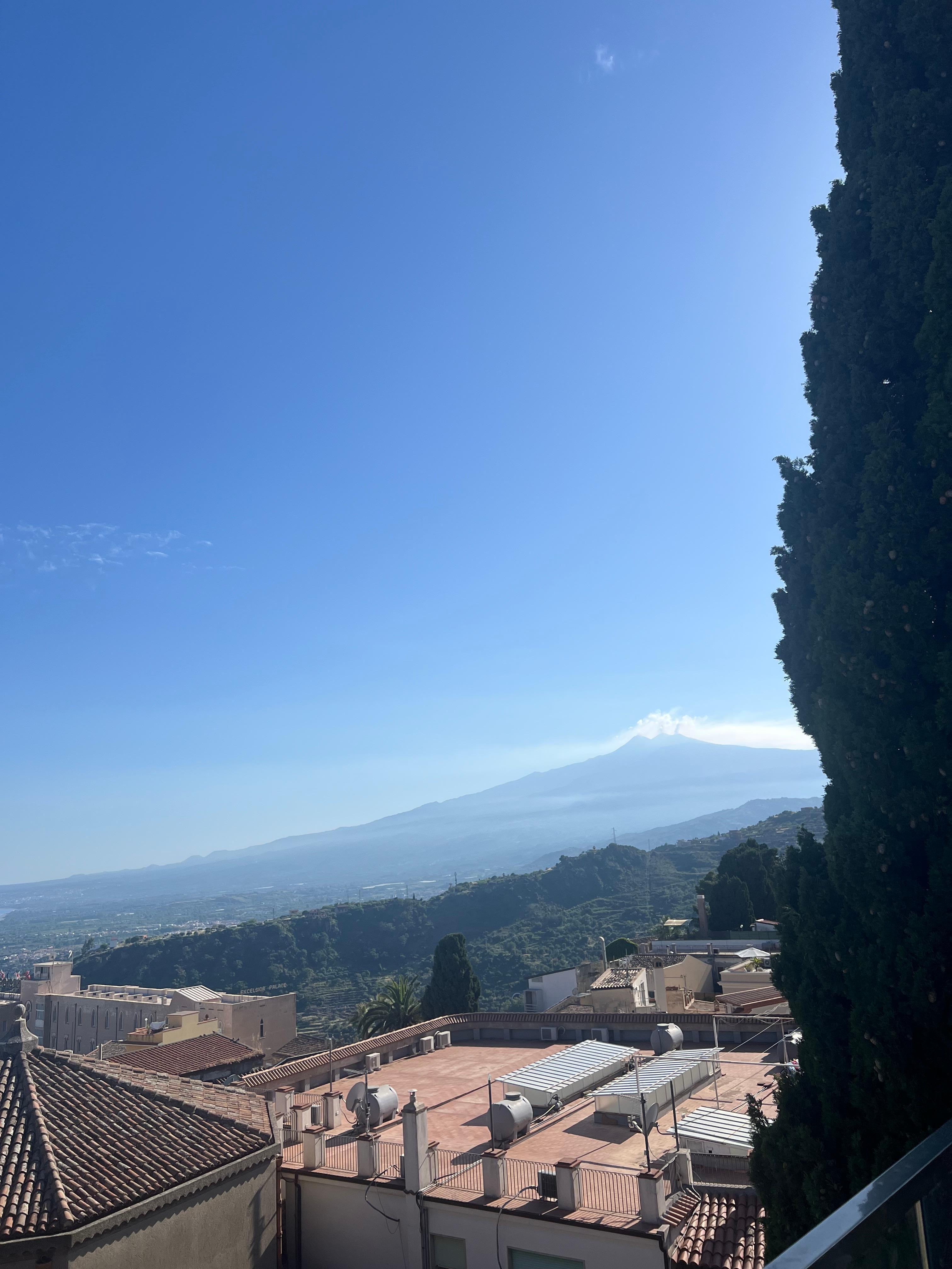 View of Mt. Etna from rooftop bar