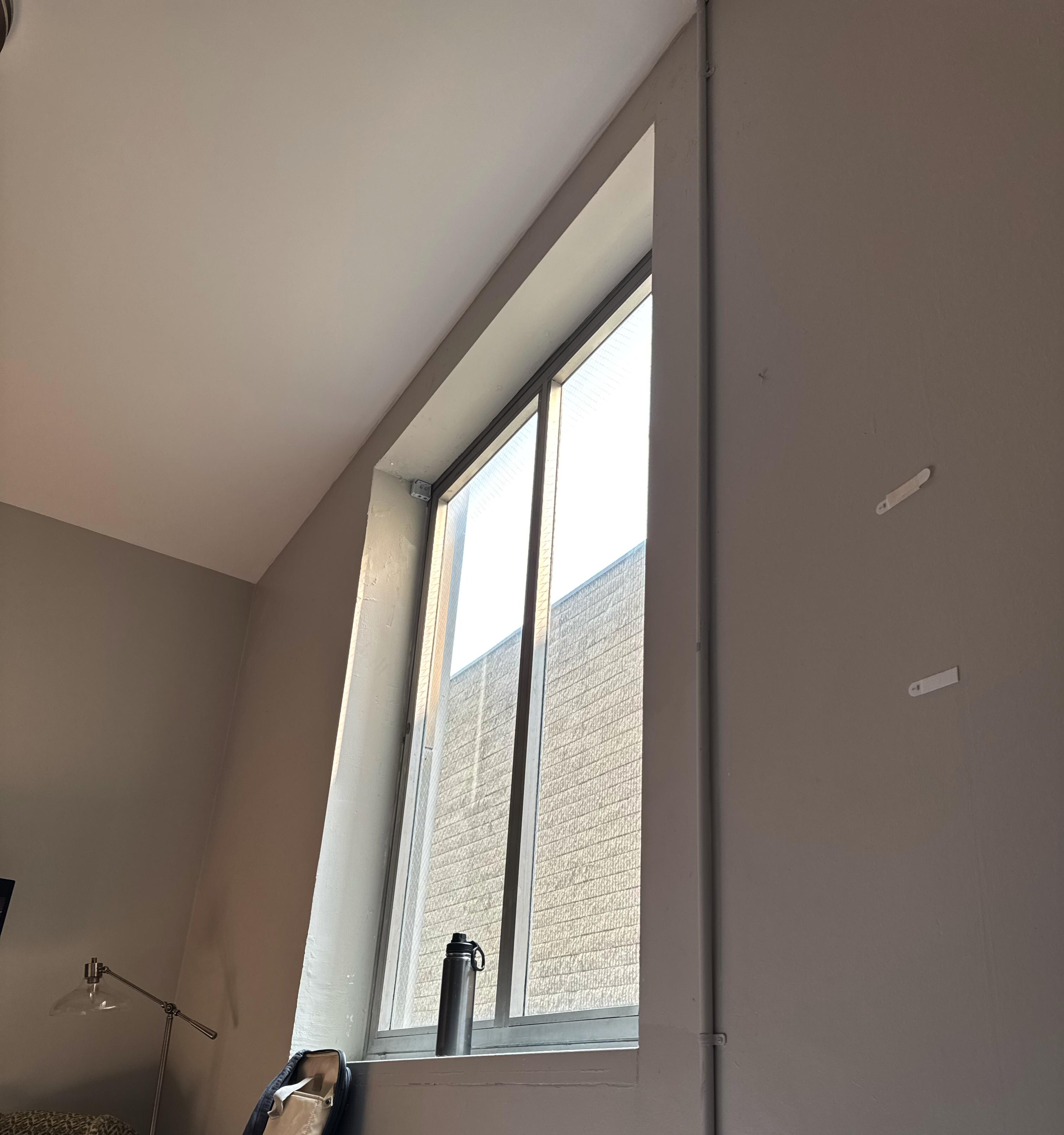 This is a picture I shared with the property contact, clearly the blinds existed at some point as there are the insert there.  There were also random 3M hanging things with nothing on them.  It was very weird, this was the only picture I took.
