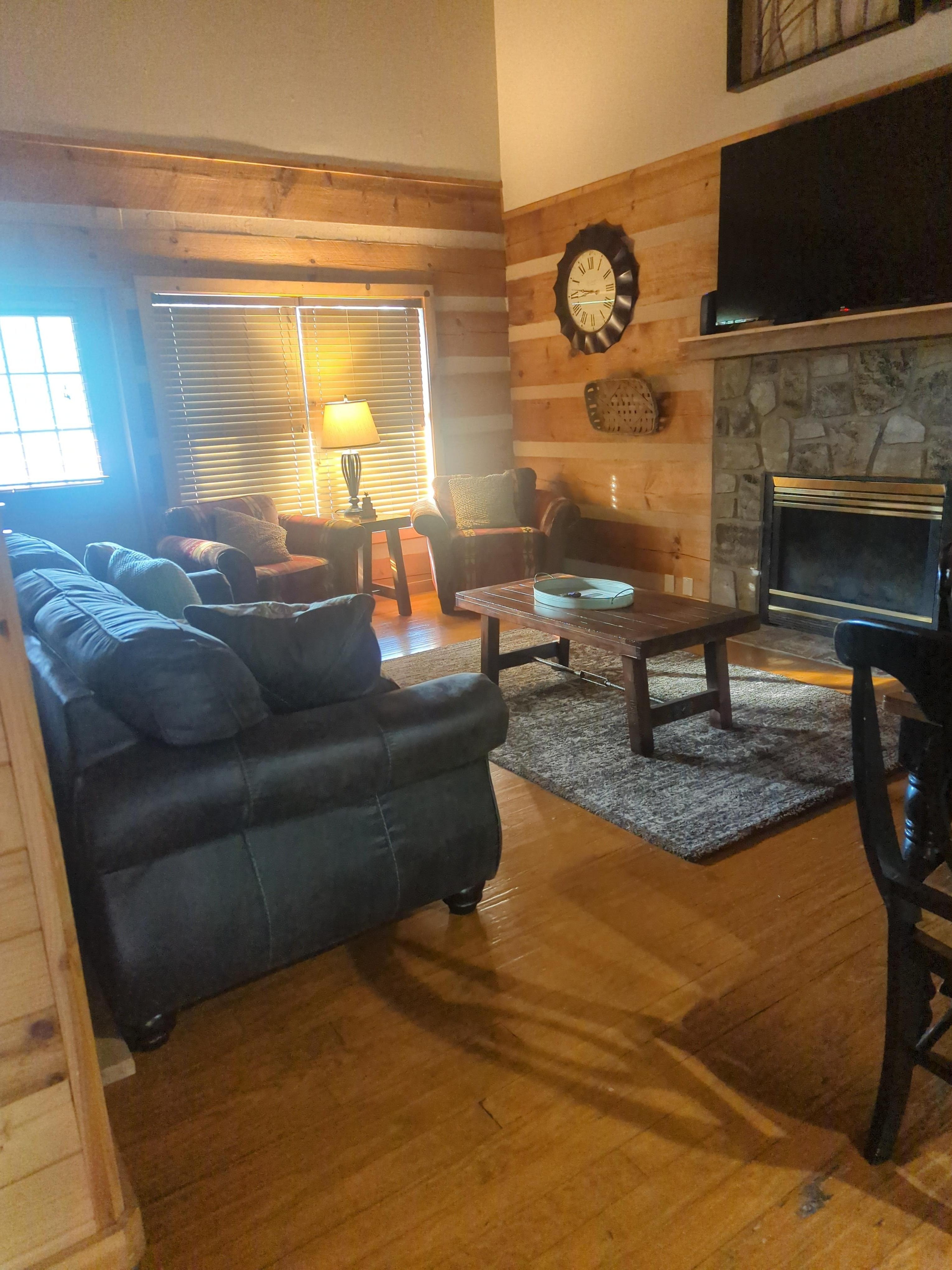 Living room is cozy. Bring a blanket to snuggle while watching a movie 