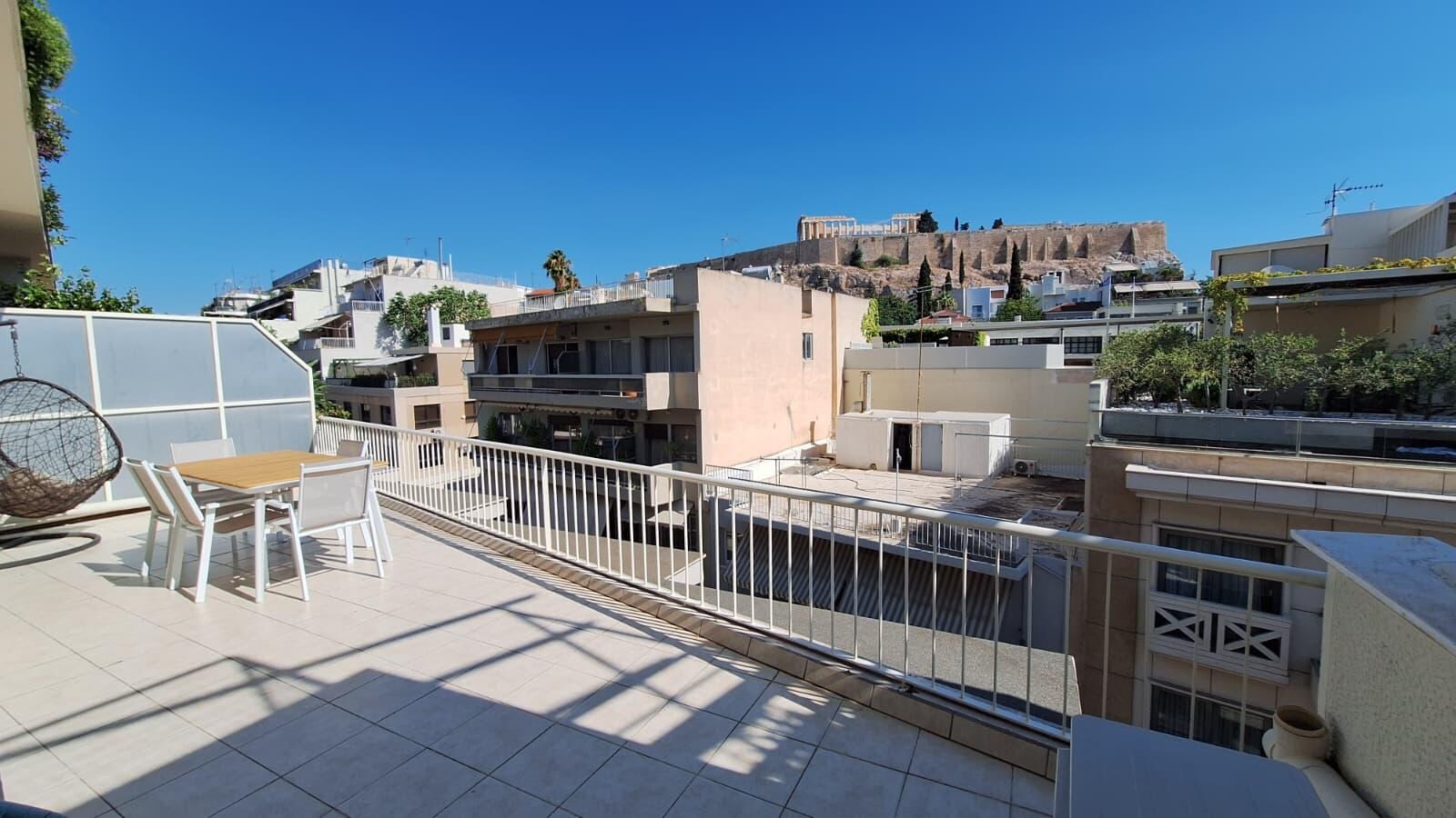 Uncropped view from one corner of one of the two patios (Acropolis looks bigger/closer in person)