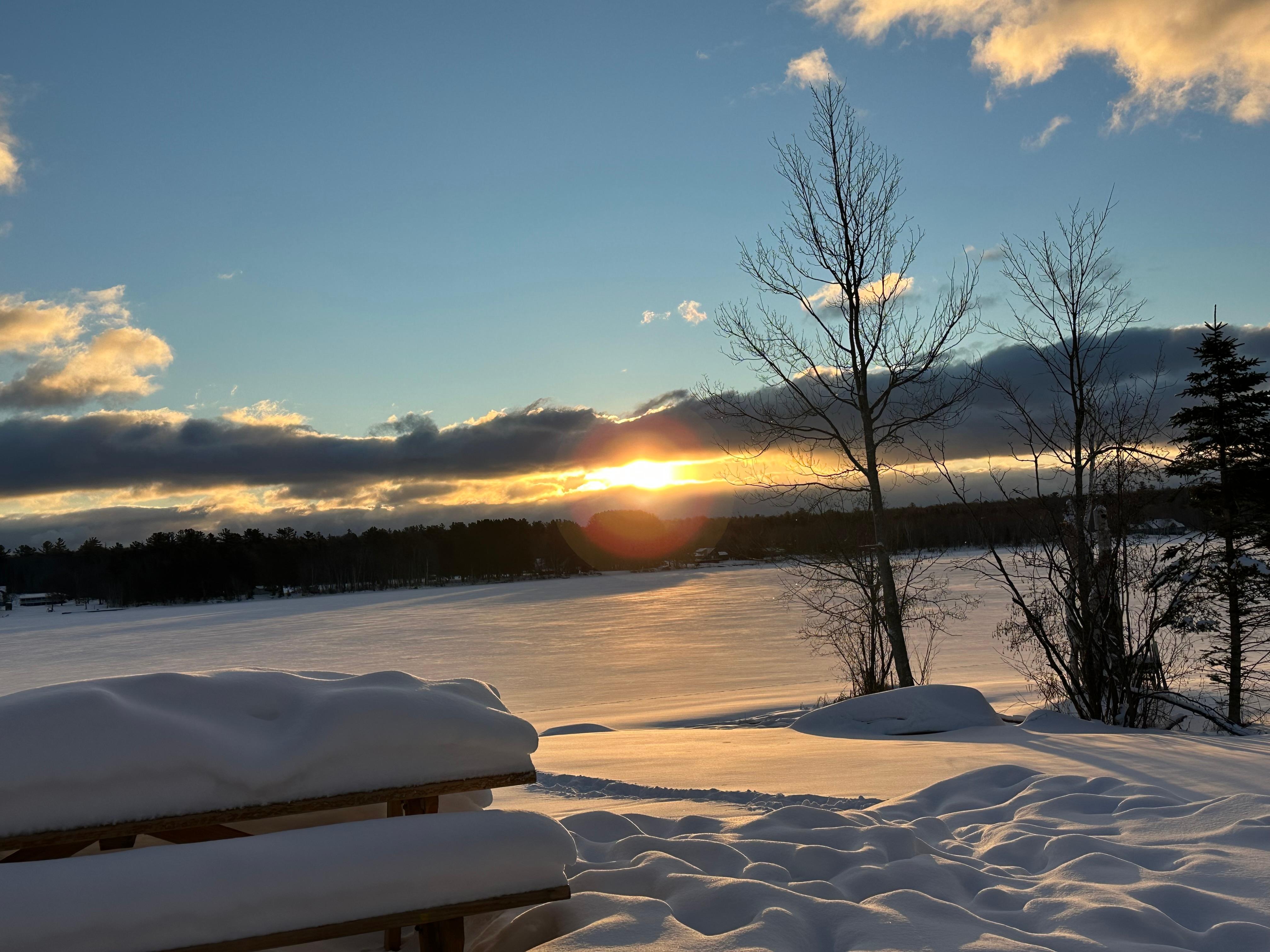 View of sunrise from the house overlooking the lake. 