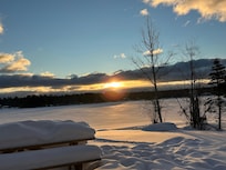 View of sunrise from the house overlooking the lake.