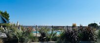 The pool with the river behind it