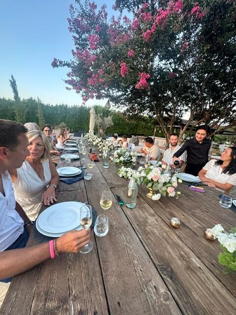 Dinner with the family beyond the pool