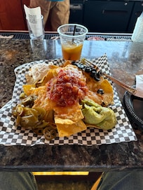 Happy hour nachos and Long Island iced tea