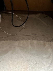 Towel soaking and showing how dirty the floor and water was.