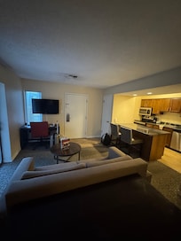 View from bed to kitchen/living room