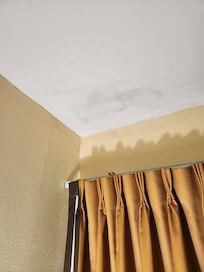 More water damage on ceiling in our room.