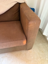 Dirty mismatched couch