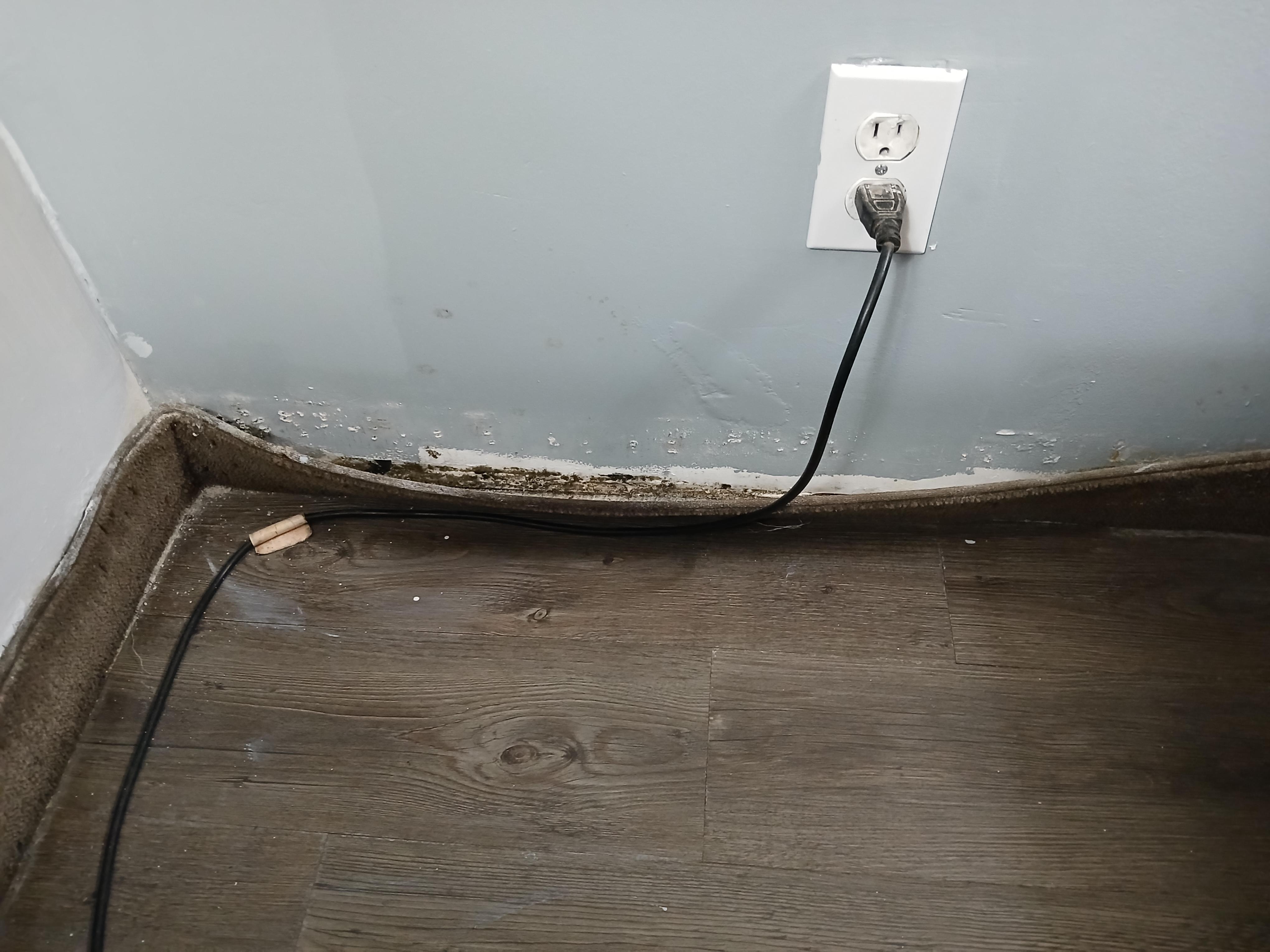 2nd room, baseboard falling off and filthy