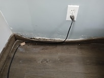 2nd room, baseboard falling off and filthy