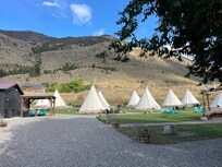 This shows how close the bathrooms/showers (building on left) are from the teepees.