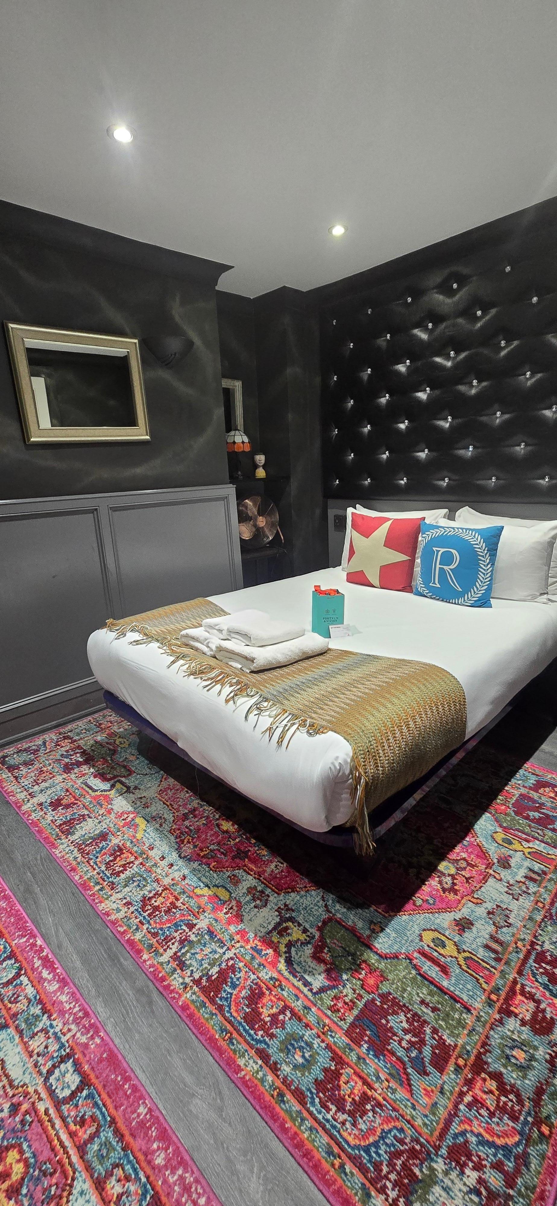 Bedroom, Queen size bed. An electric fan was provided for hot weather.