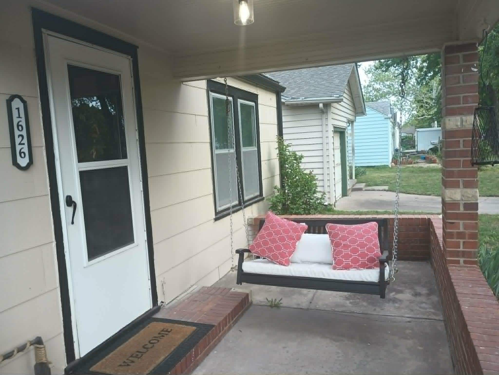 nice front porch swing, just can't swing on it when raining because it is attached to the edge of the porch.