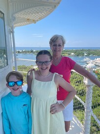 The top of the Hope Town lighthouse is a must to see the panoramic scenery.