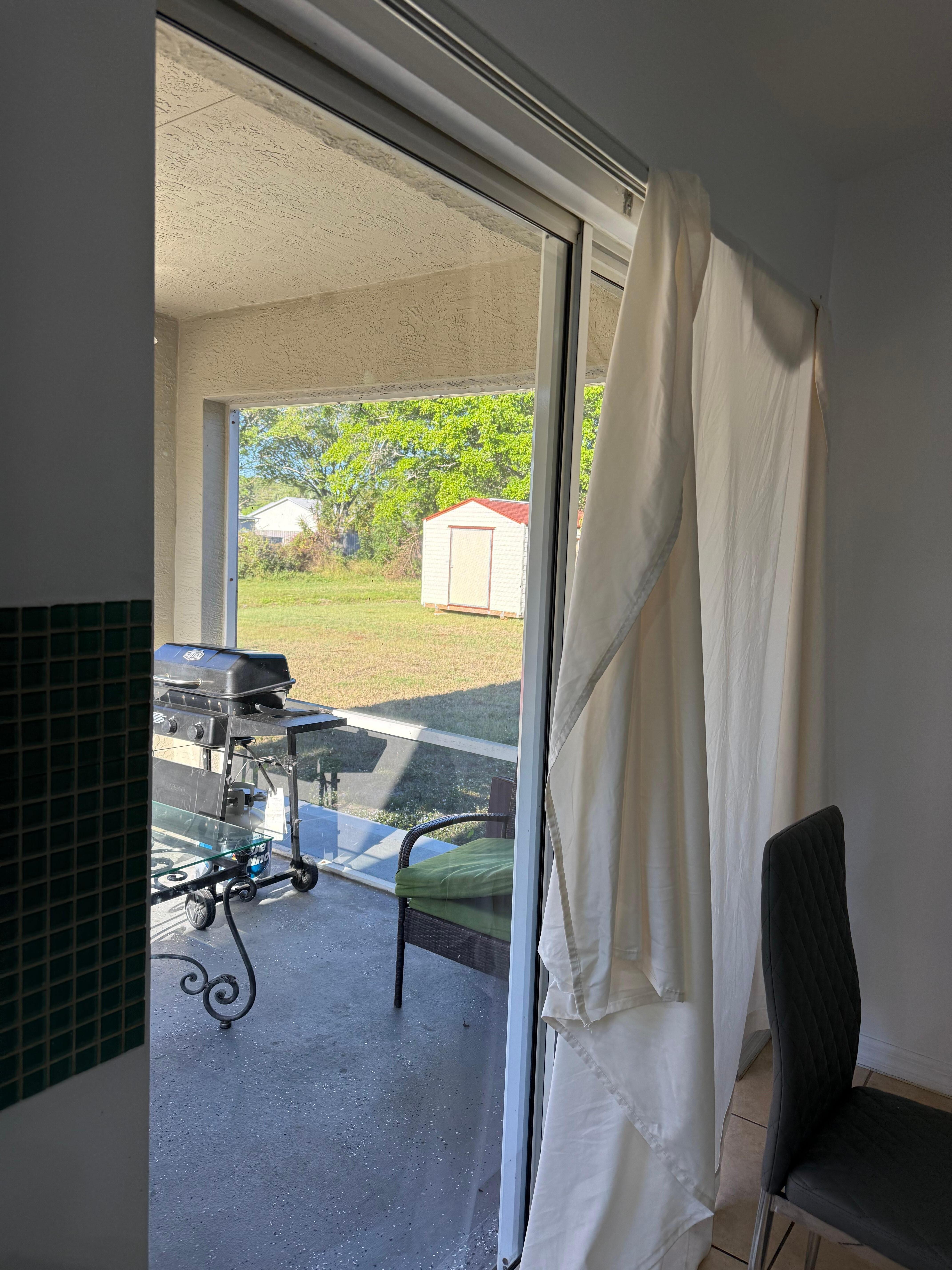 Had to hang a sheet on sliders for privacy