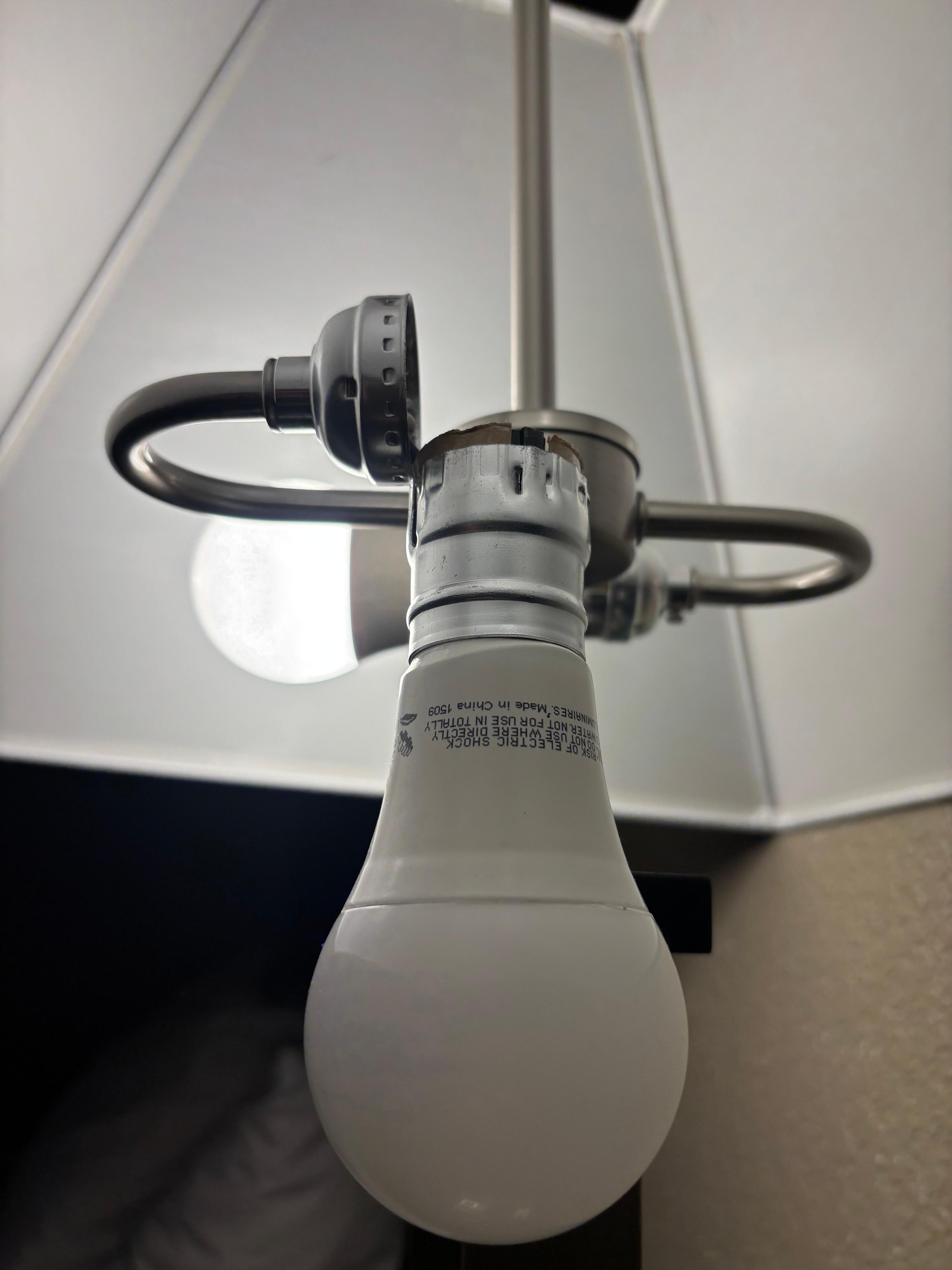 Broken lamp with exposed wires