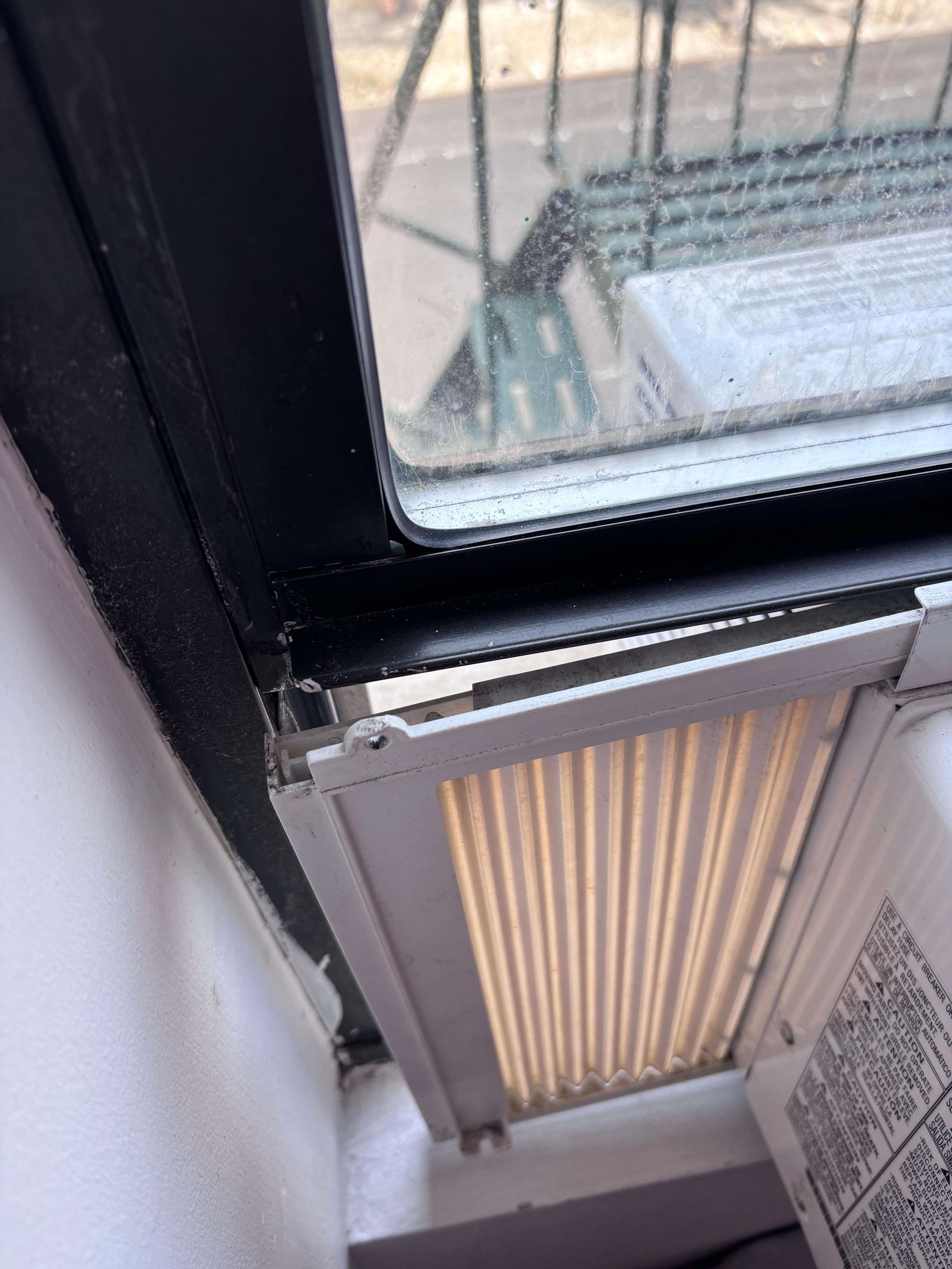 Other side of the AC unit. Hear every noise all night long from the street below. 