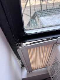 Other side of the AC unit. Hear every noise all night long from the street below.