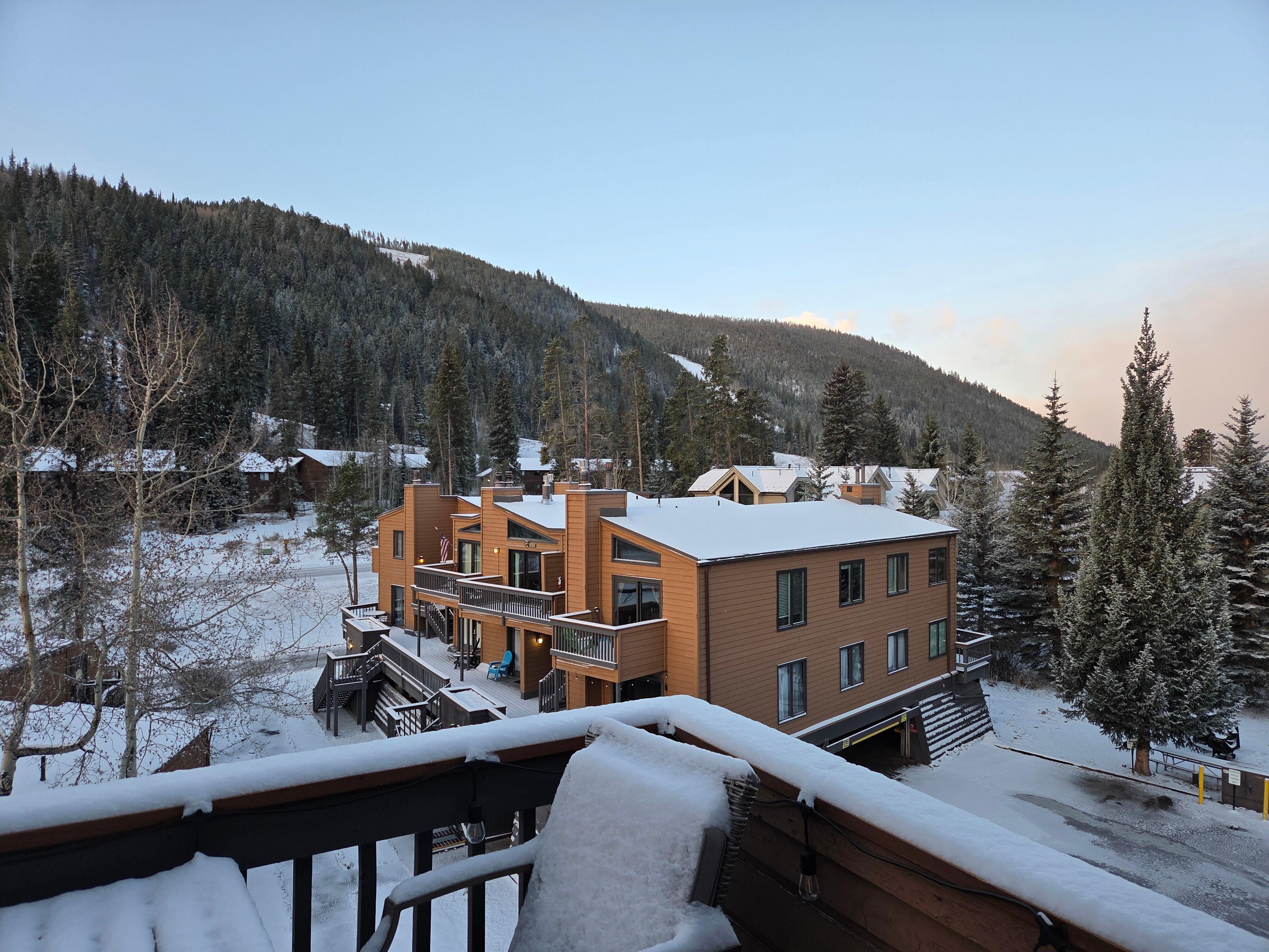 View off the back deck after a Spring snow.