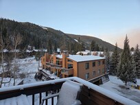 View off the back deck after a Spring snow.