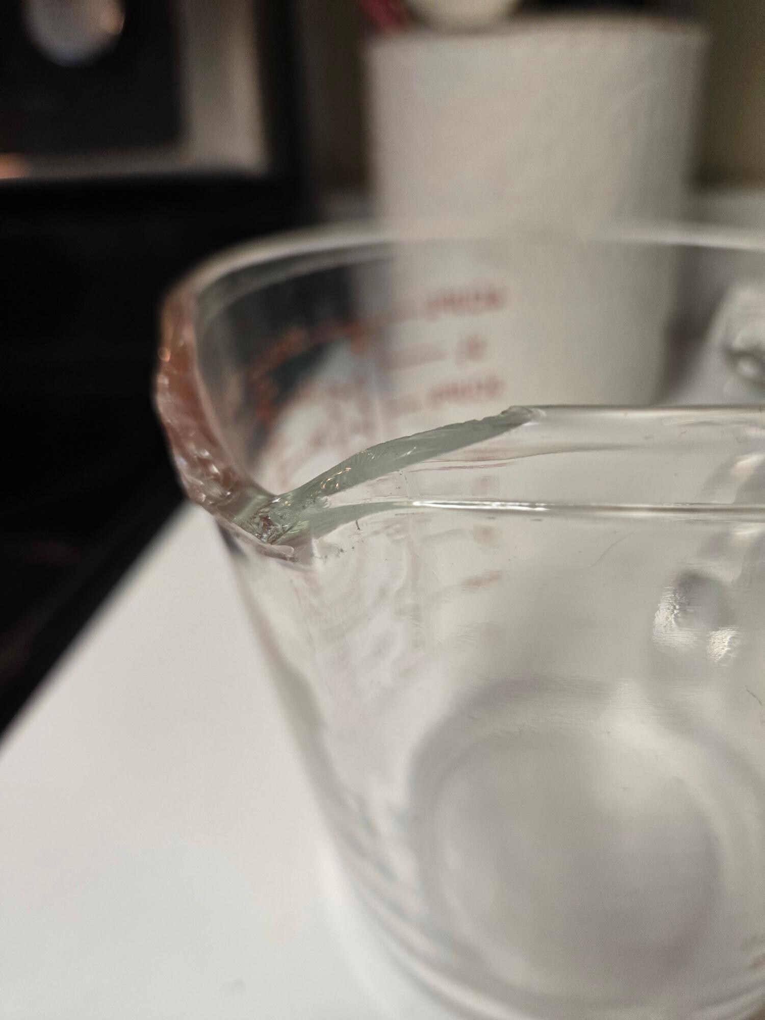 Broken measuring cup from kitchen cabinet