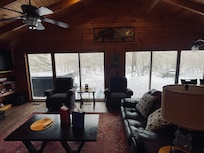 Cozy cabin overlooking river