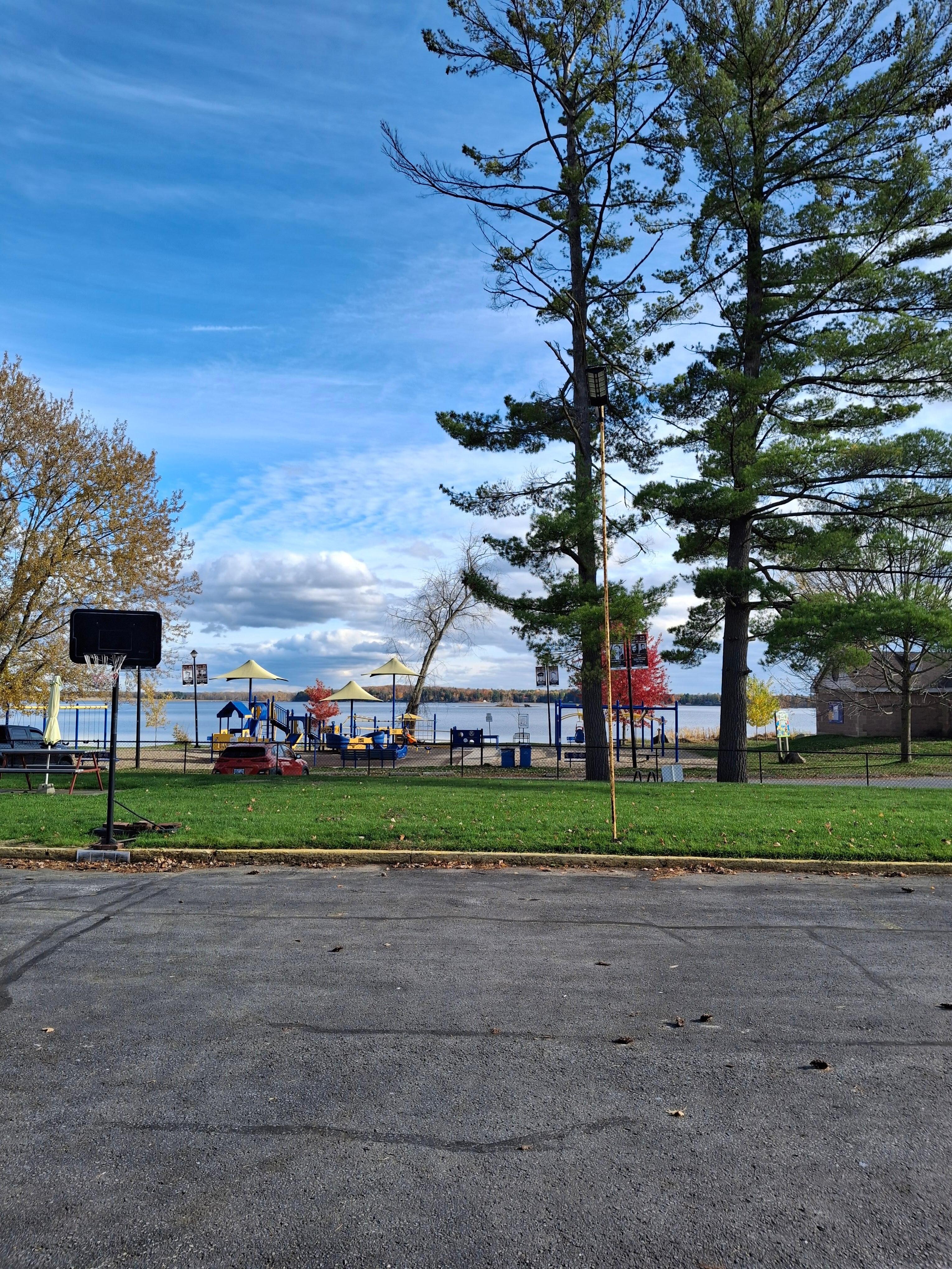 Park right across from the parking lot, next to the lake.