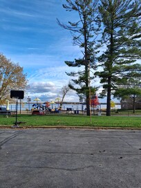 Park right across from the parking lot, next to the lake.