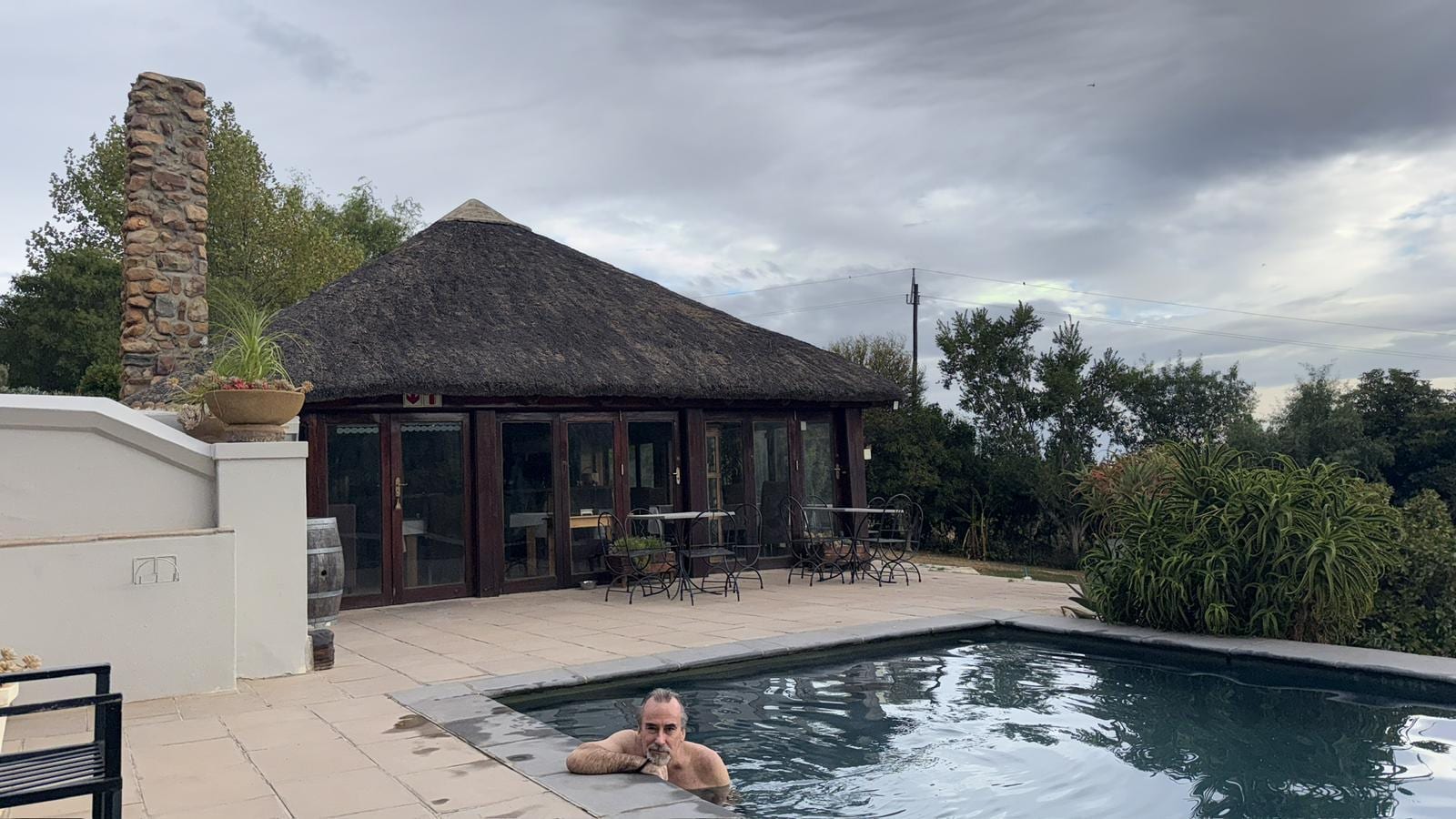 Breakfast was served in the lovely thatched dining room beside the pool. Fruit orchards and mountain views surround. Beautiful!