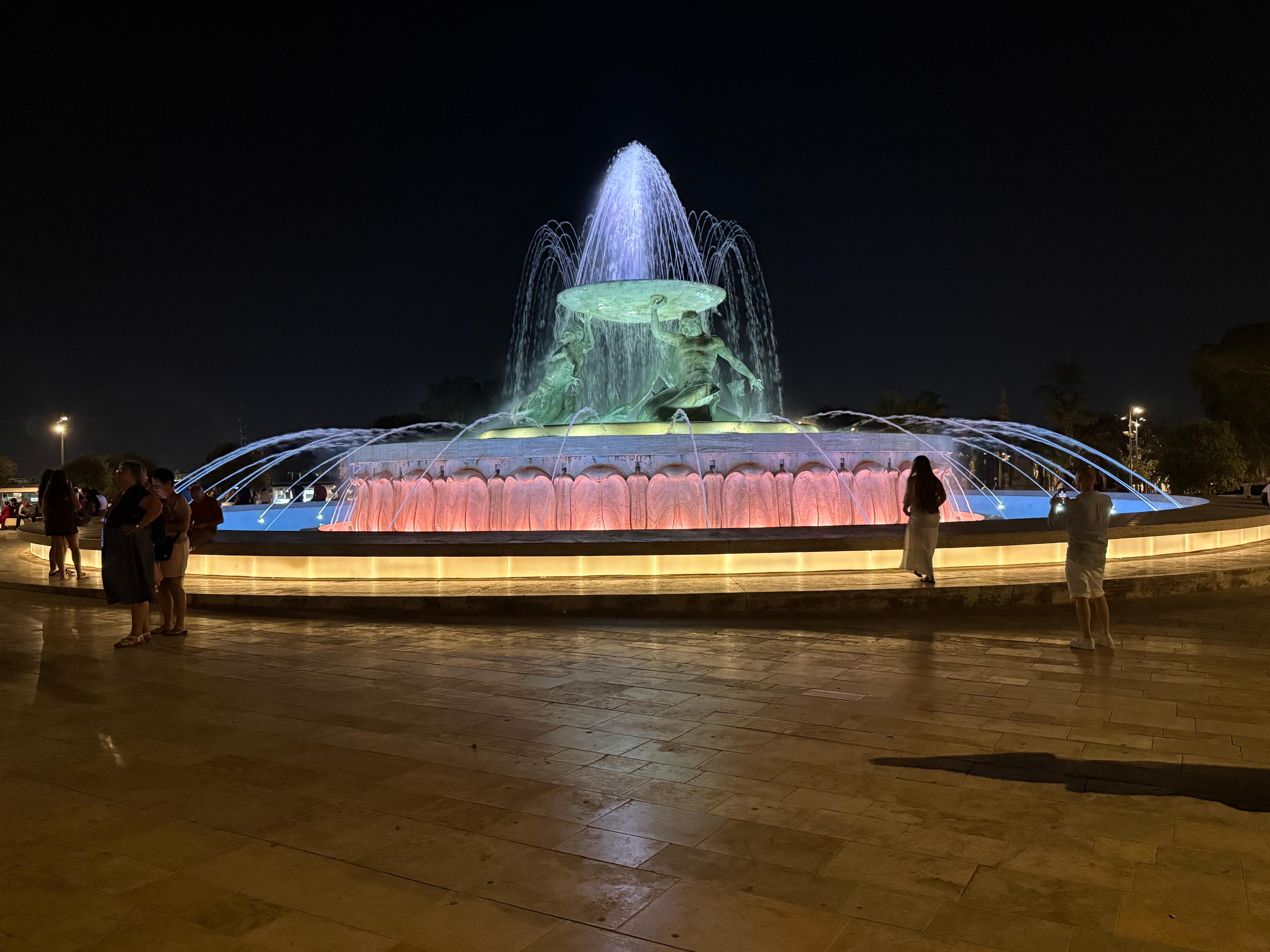Triton Fountain is a must see at night.