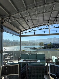 From inside an enclosed glass patio.