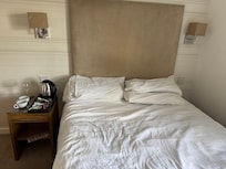 One unusable bedside cabinet