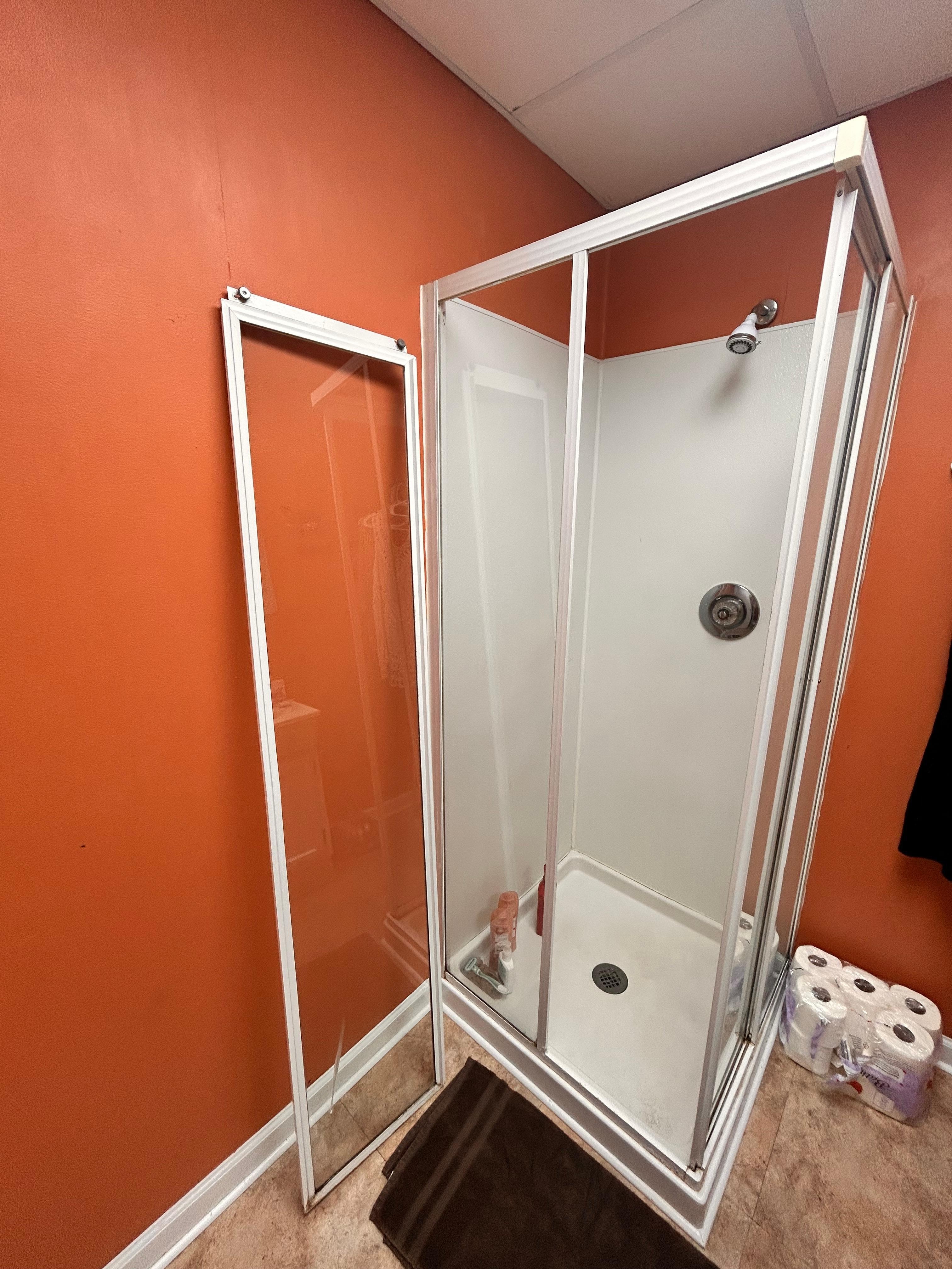 Tried to put door back on but door would not slide because track is bent. 