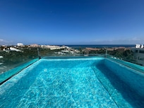 View from unit C24 at 2nd floor. Pool is not heated, so stay here from April at the earliest.