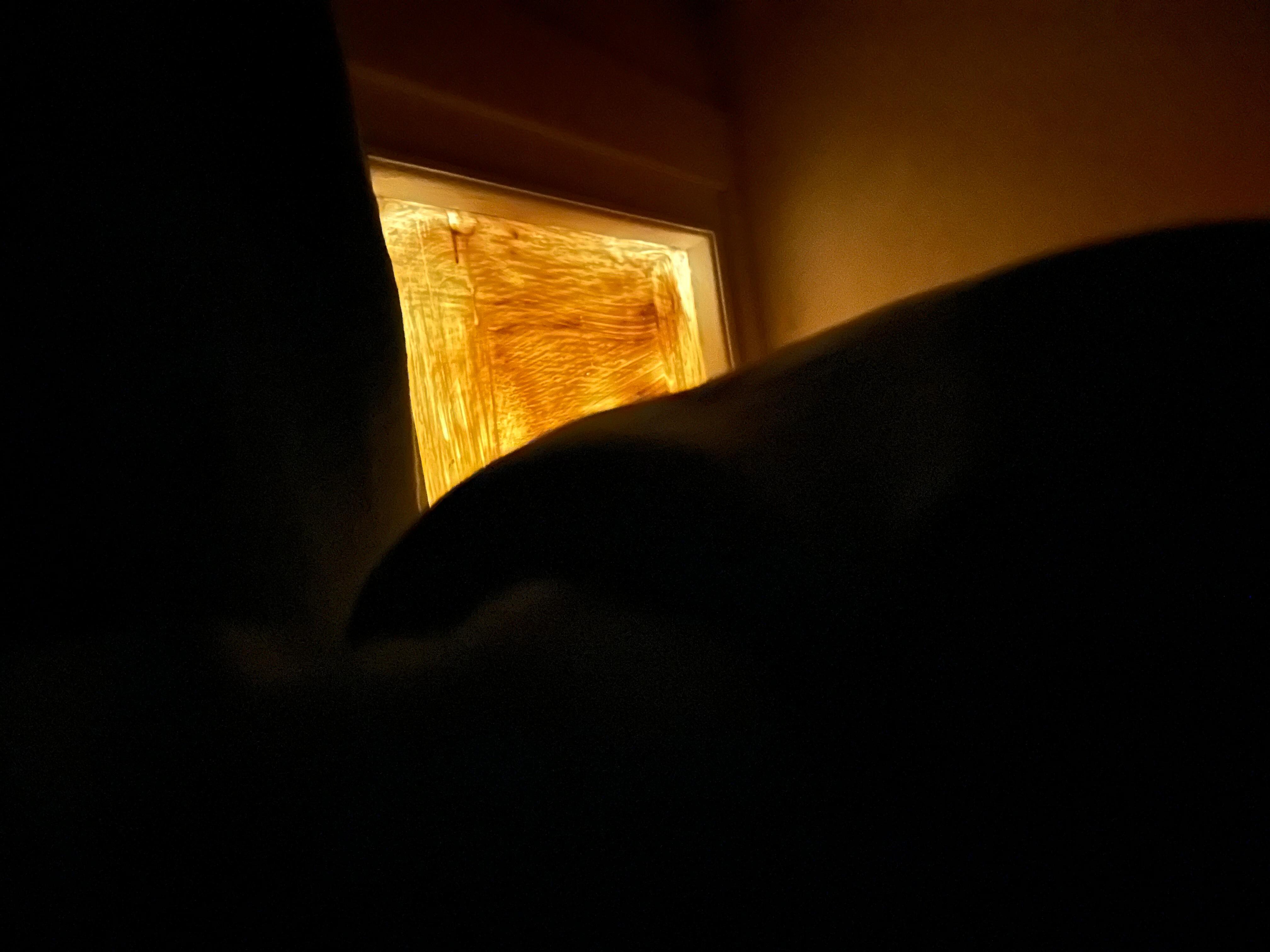 Lights off but painted glass behind the bed!?